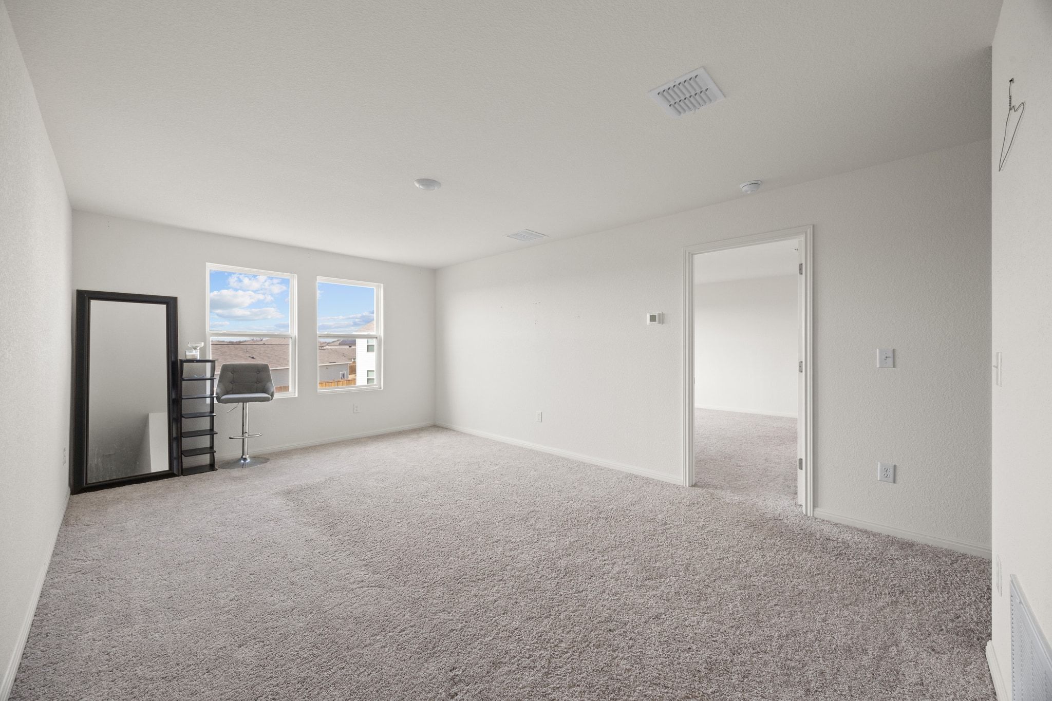 410 Magnum Force Drive Jarrell, TX 76537 - Photo 18 of 32 a view of an empty room with a window