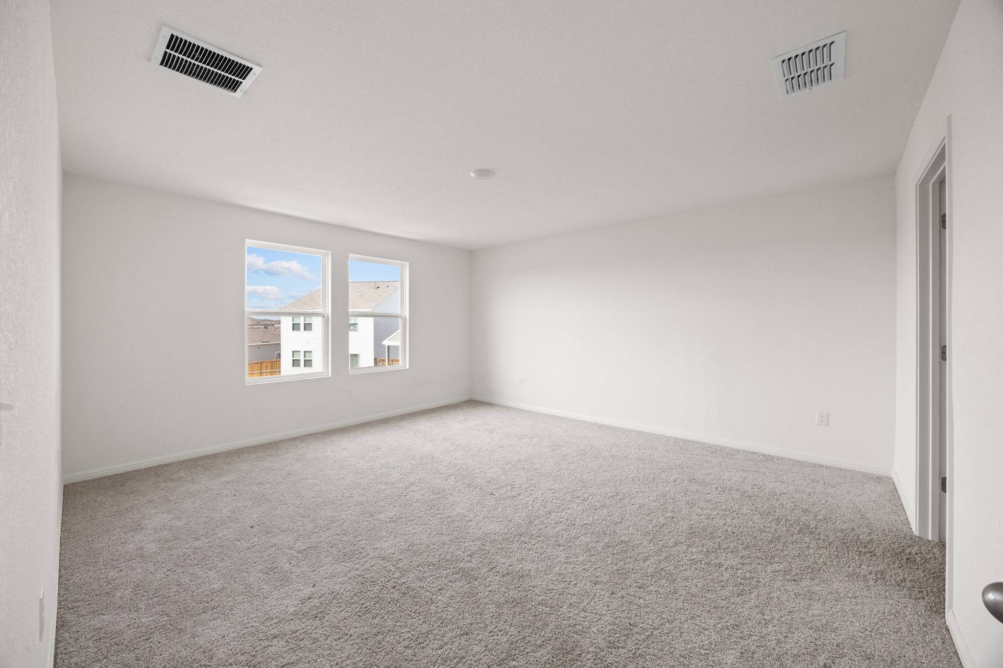 410 Magnum Force Drive Jarrell, TX 76537 - Photo 20 of 32 an empty room with windows