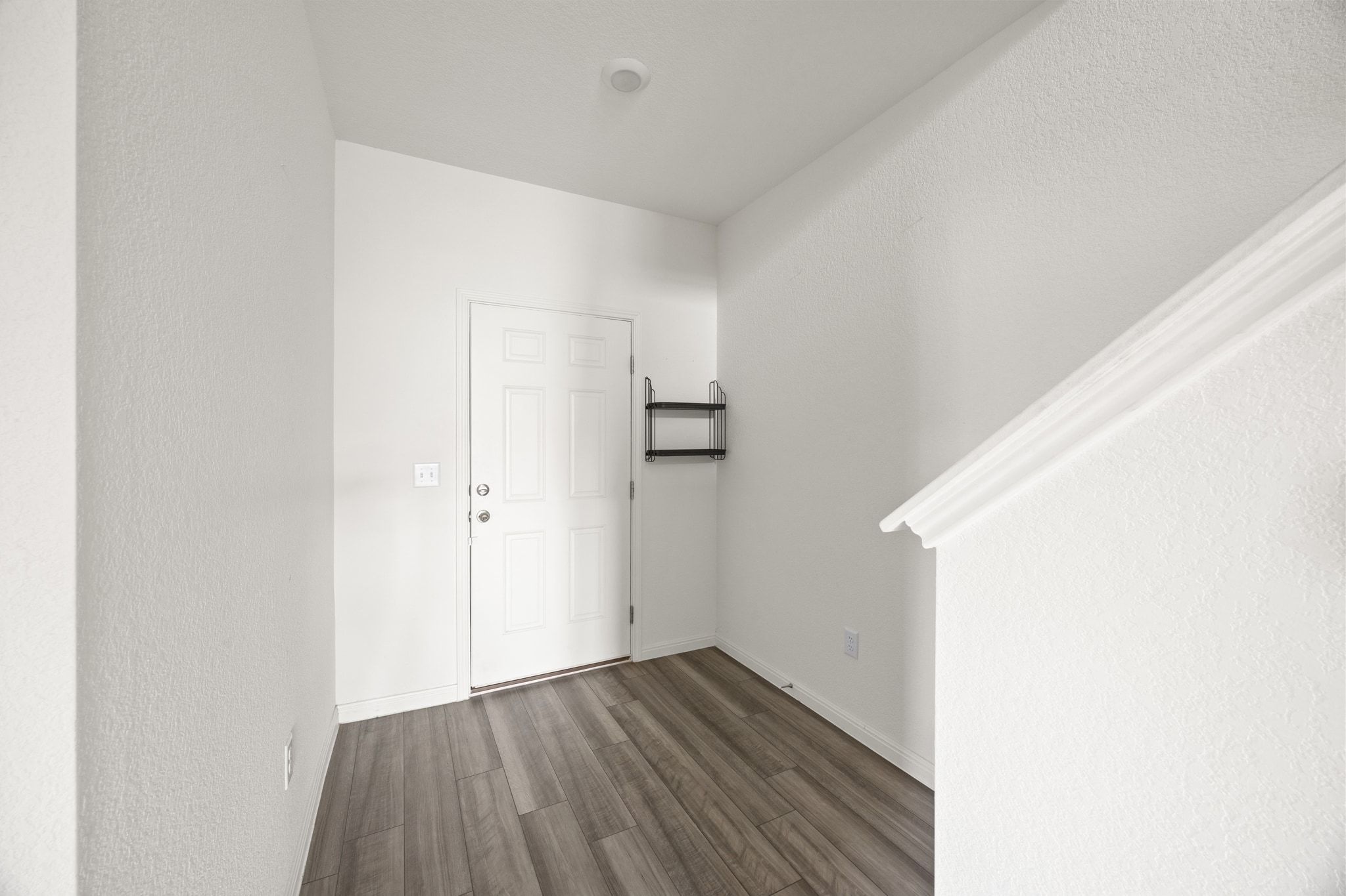 410 Magnum Force Drive Jarrell, TX 76537 - Photo 4 of 32 a view of empty room with wooden floor