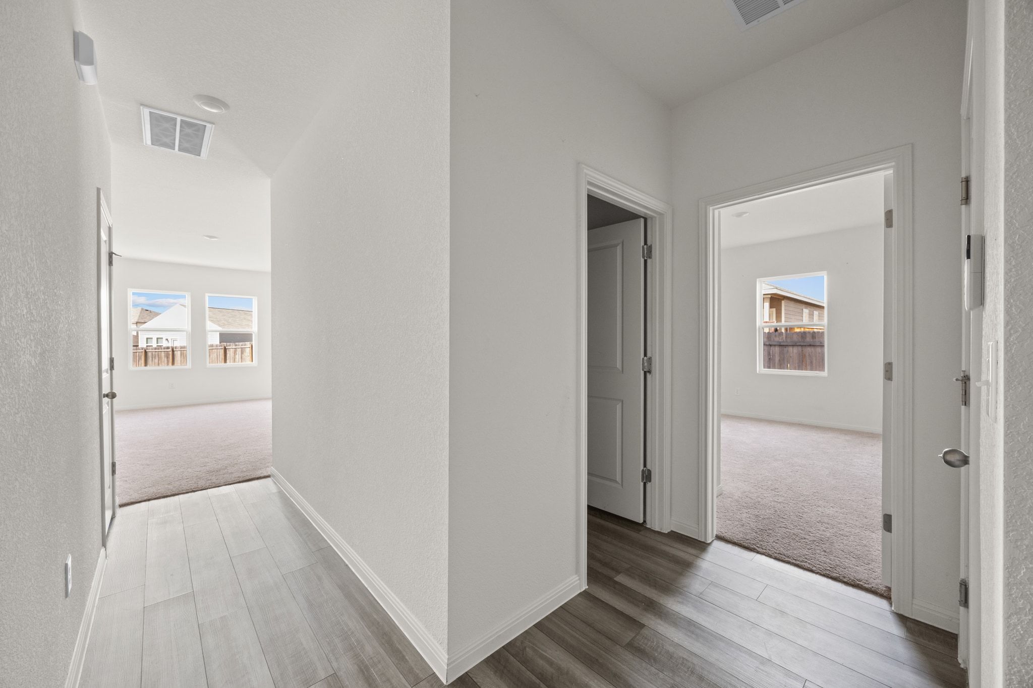 410 Magnum Force Drive Jarrell, TX 76537 - Photo 5 of 32 a view of a hallway with wooden floor