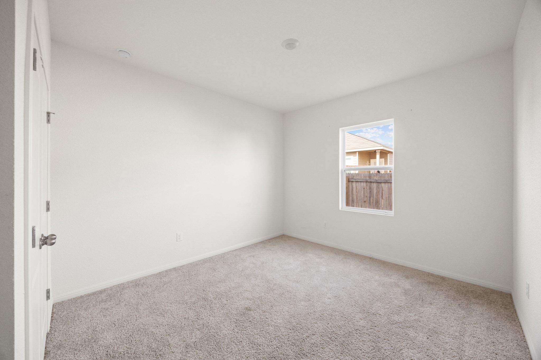 410 Magnum Force Drive Jarrell, TX 76537 - Photo 6 of 32 a view of an empty room with a window