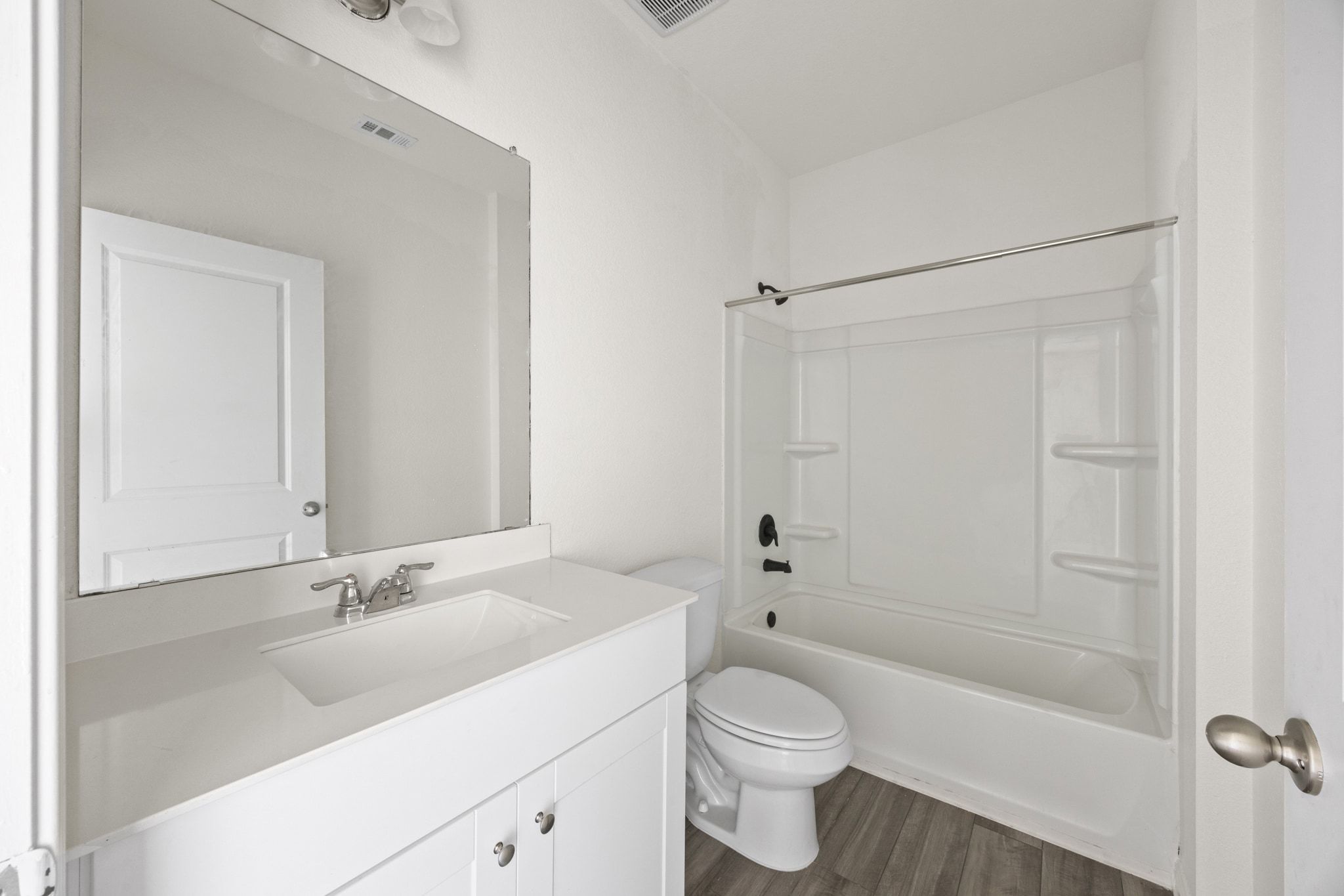 410 Magnum Force Drive Jarrell, TX 76537 - Photo 8 of 32 a bathroom with a sink a toilet and shower