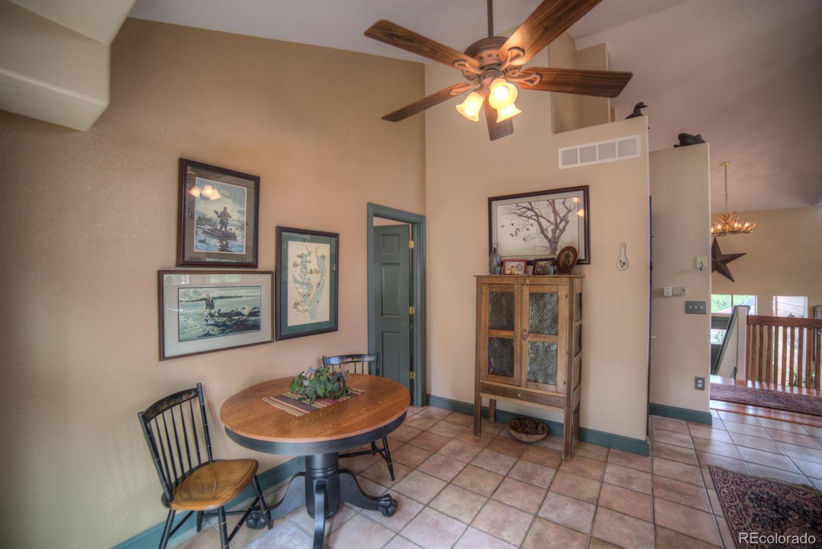 264 Hangmans Road Bailey, CO 80421 - Photo 12 of 33 a view of a livingroom with furniture and a kitchen