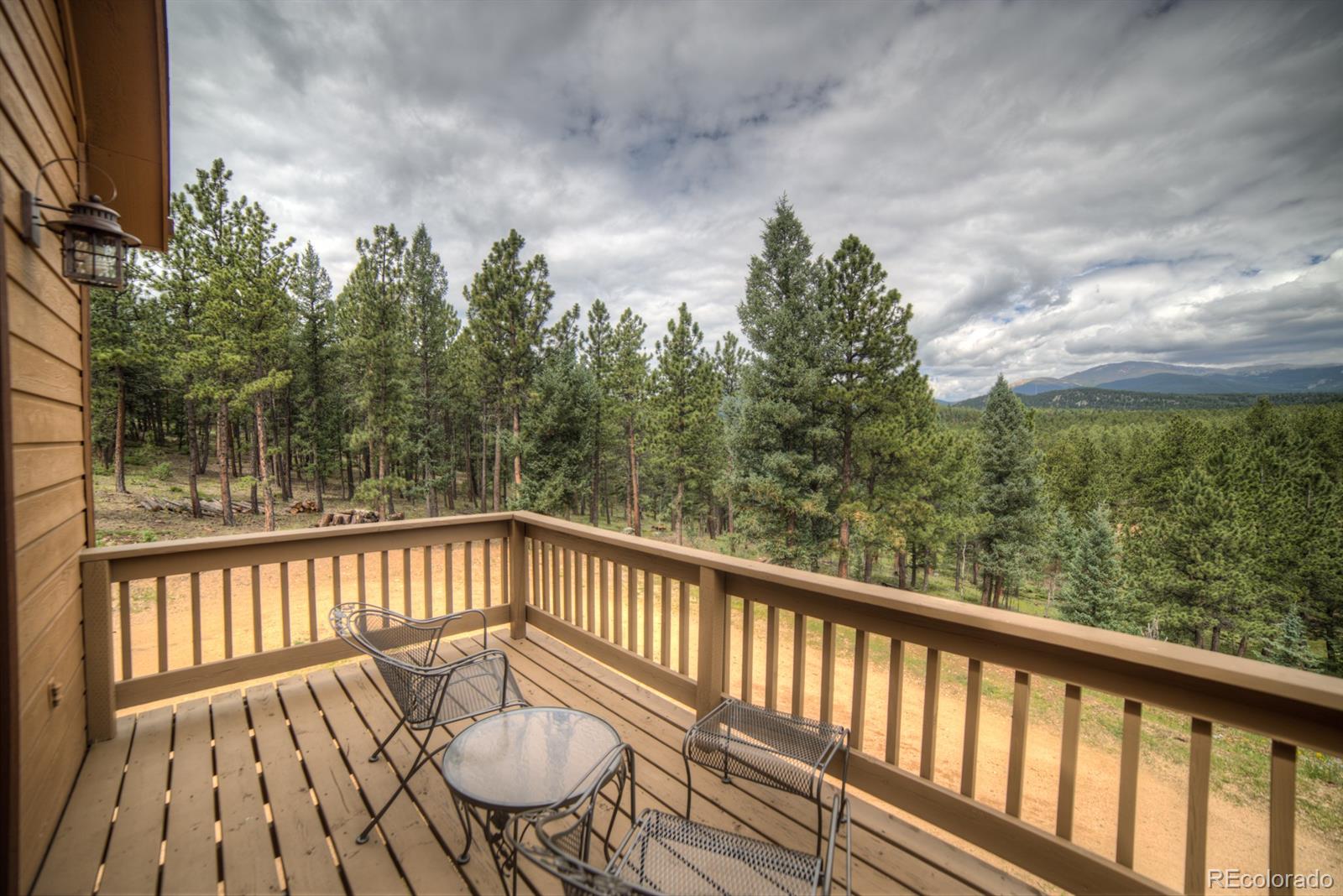 264 Hangmans Road Bailey, CO 80421 - Photo 20 of 33 a view of balcony with furniture