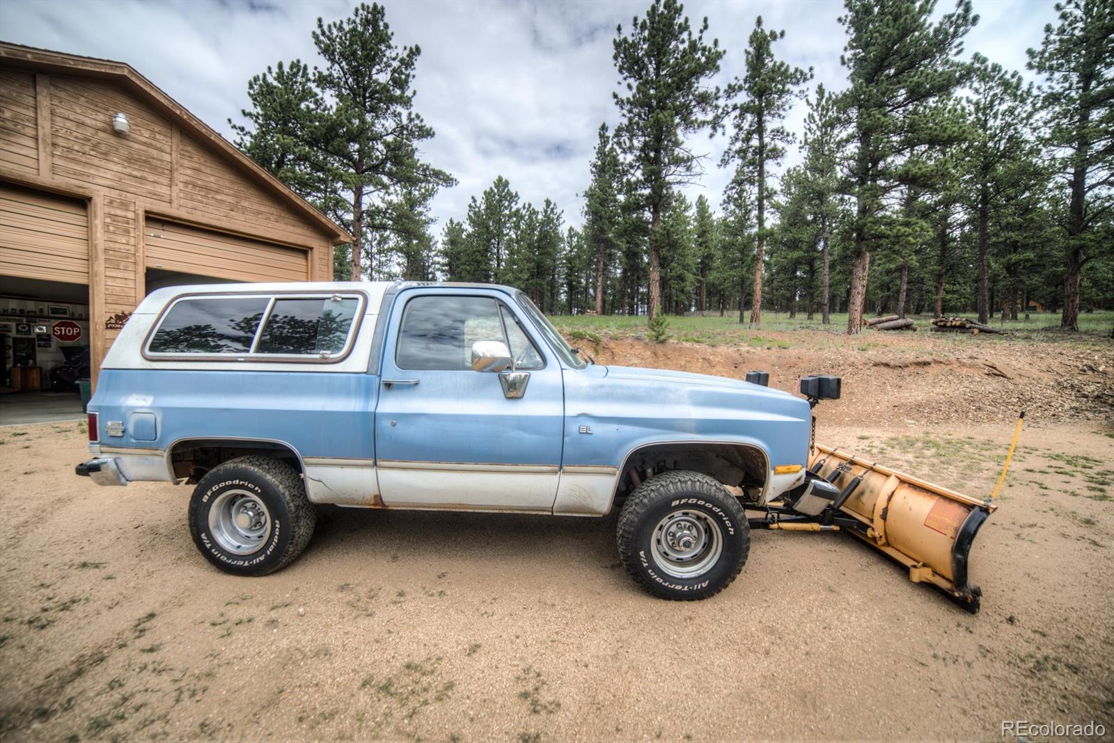 264 Hangmans Road Bailey, CO 80421 - Photo 32 of 33 a view of a car parked in a parking space