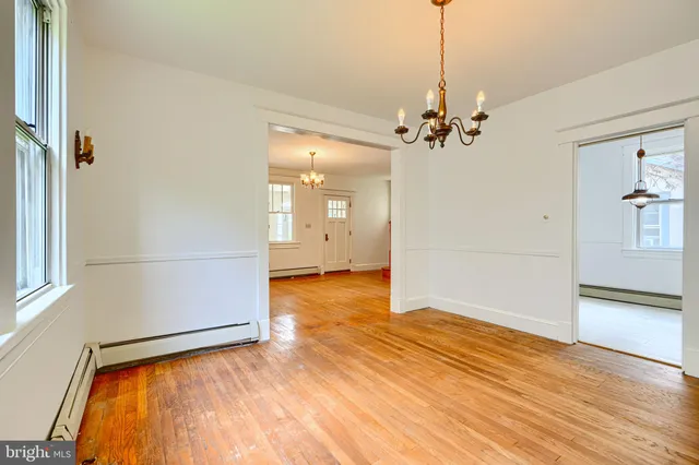 a view of a bathroom with a tub and shower
