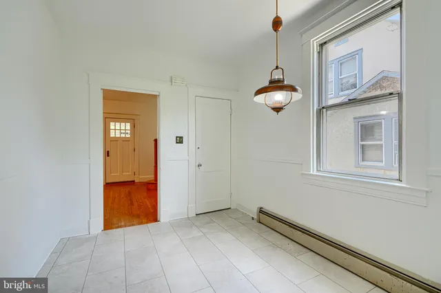 a kitchen with stainless steel appliances granite countertop a stove and a microwave