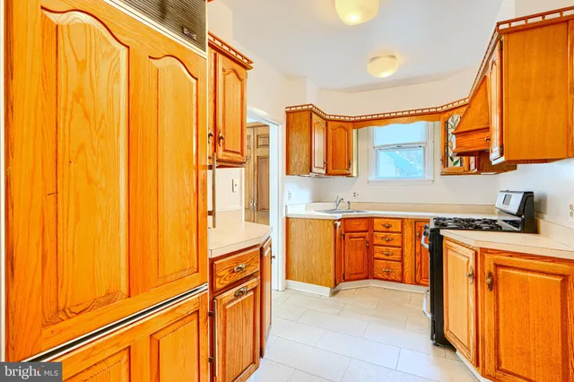 a view of a bathroom with a shower and a window