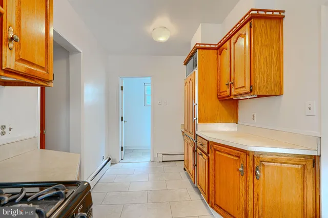 a bathroom with a tub and shower