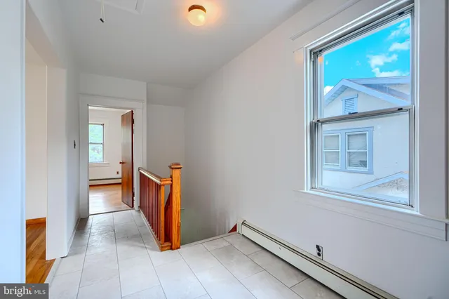 a bathroom with a sink a toilet and tub