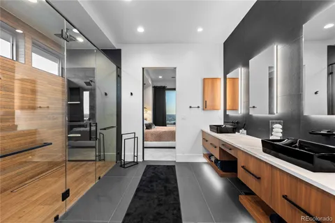 a bathroom with a toilet sink and shower