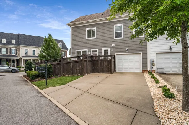 a house view with a backyard space