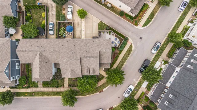 front view of a house with a garden