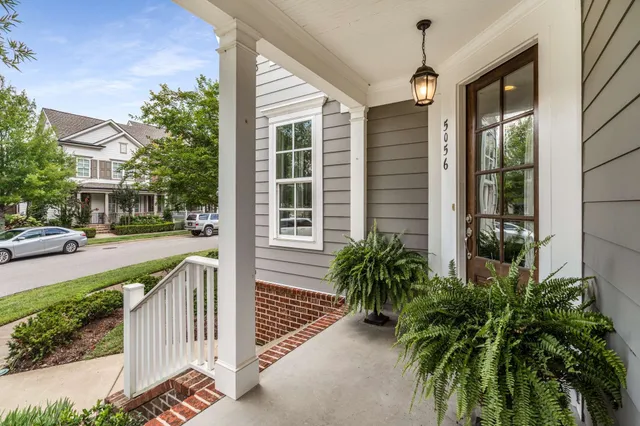 a front view of a house with a porch