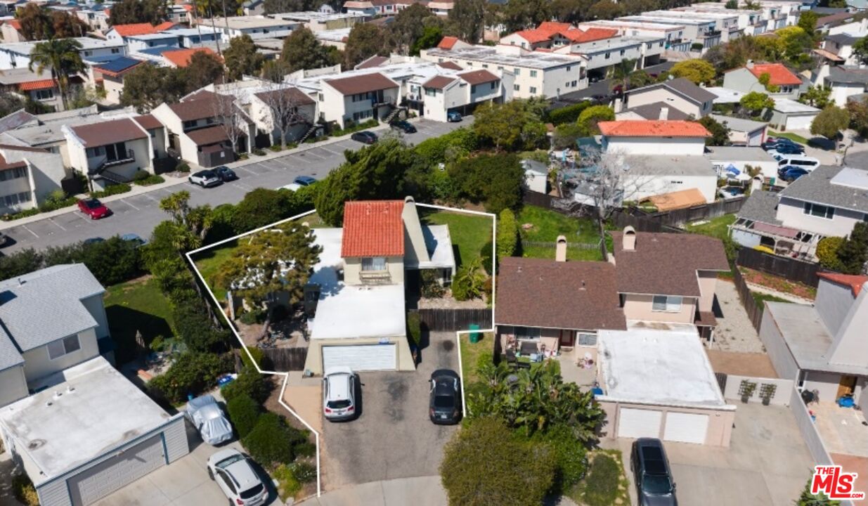 7392 Freeman Place Goleta, CA 93117 - Photo 1 of 2 an aerial view of multiple houses with yard