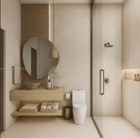 a bathroom with a toilet and a mirror