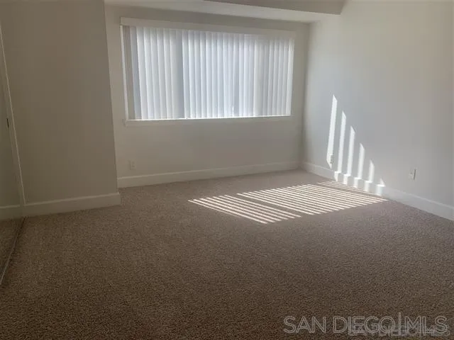 8520 Via Mallorca, Unit K La Jolla, CA 92037 - Photo 5 of 12 an empty room with windows