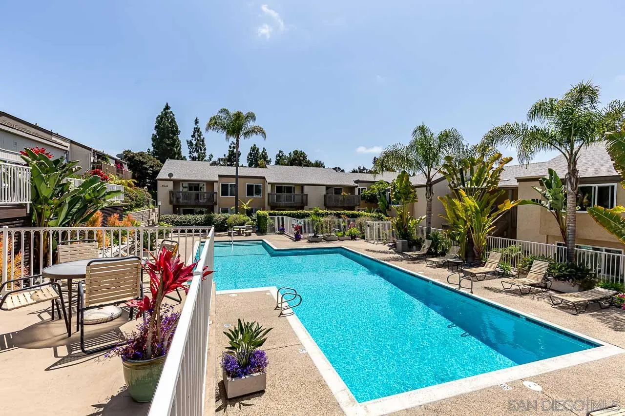 8520 Via Mallorca, Unit K La Jolla, CA 92037 - Photo 8 of 12 a view of swimming pool with outdoor seating