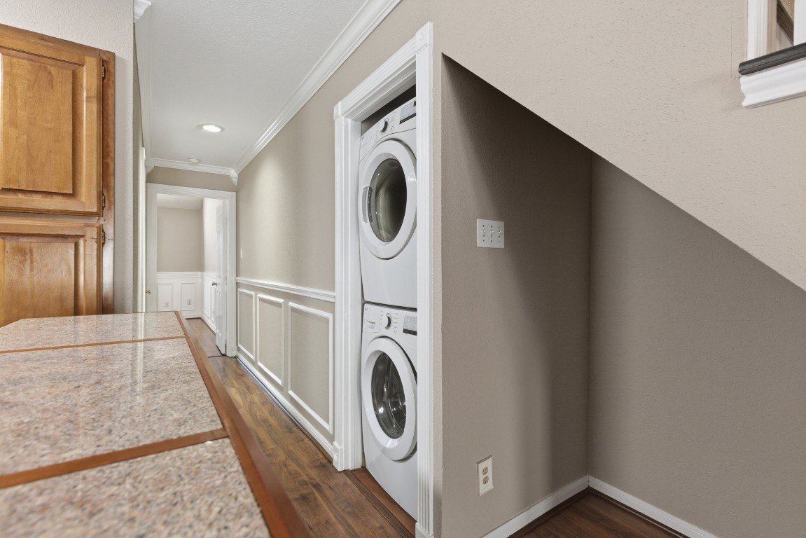 2425 Holly Hall Street, Unit 100 Houston, TX 77054 - Photo 21 of 45 Washer and dryer are included. Great flex space under stairs, next to laundry closet.