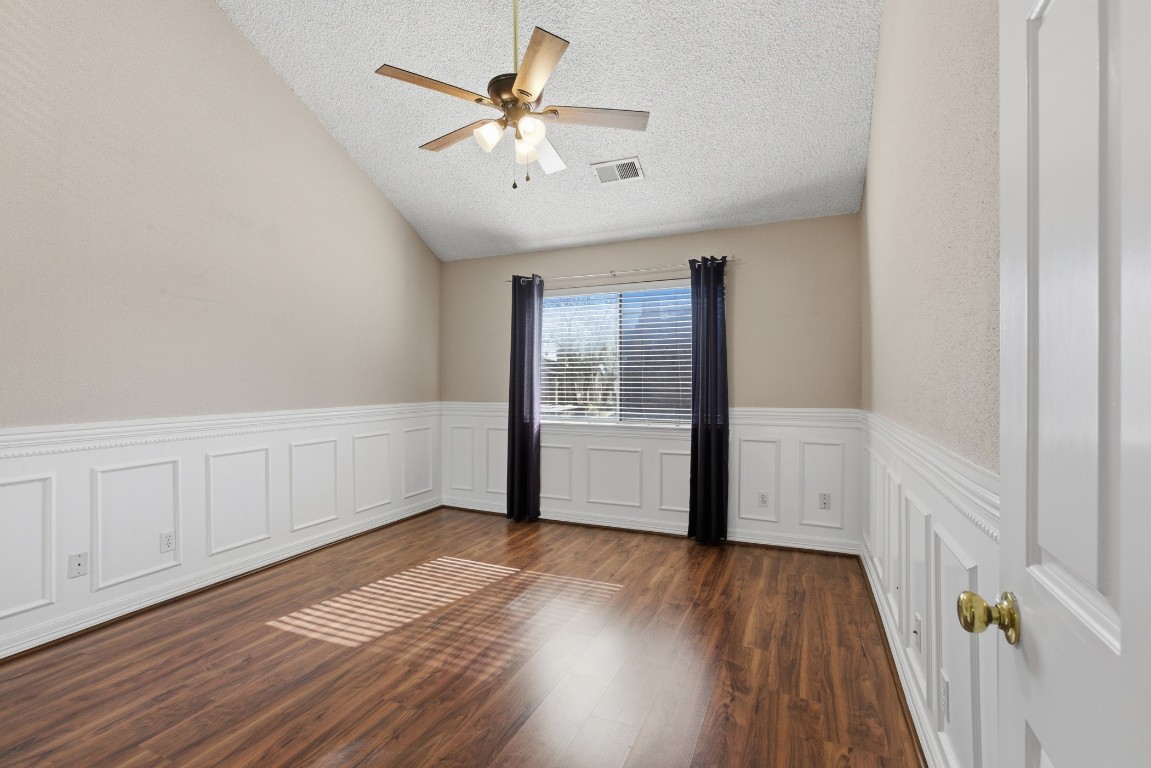 2425 Holly Hall Street, Unit 100 Houston, TX 77054 - Photo 24 of 45 Primary bedroom on main level with high ceiling and tons of natural light.