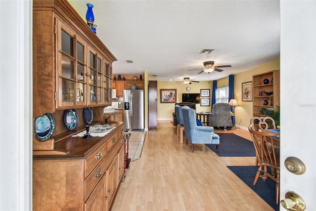 87 Lone Star Street Umatilla, FL 32784 - Photo 11 of 59 a living room with furniture and a flat screen tv