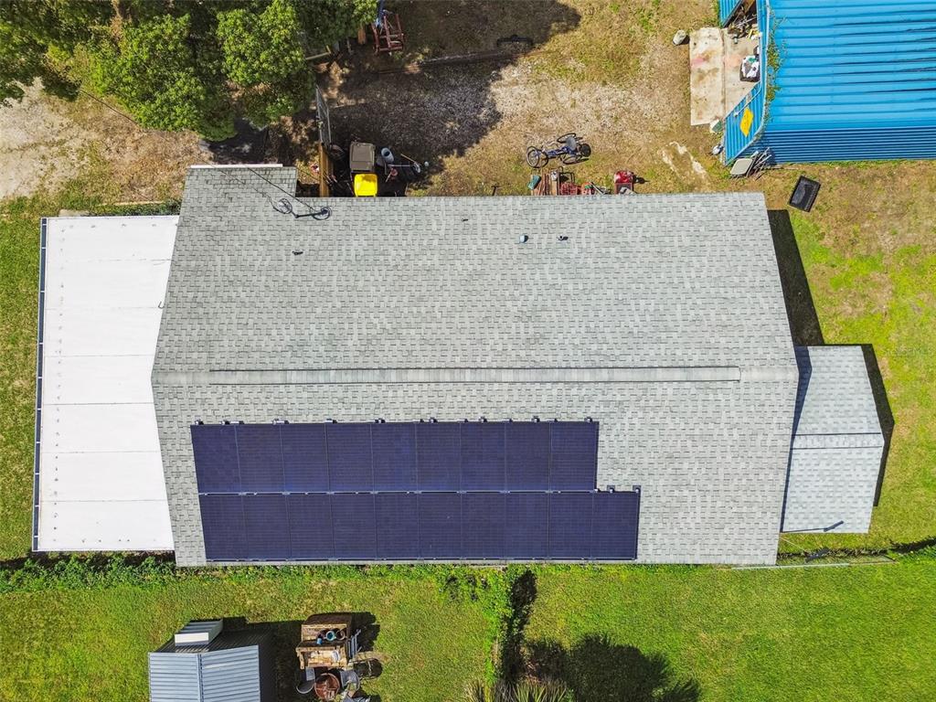 87 Lone Star Street Umatilla, FL 32784 - Photo 54 of 59 a aerial view of a house with a garden