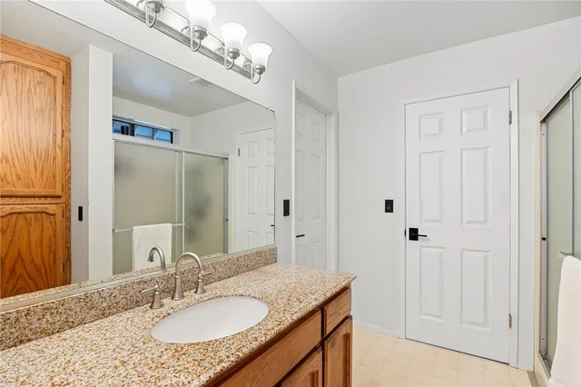 a view of room with window and ceiling fan