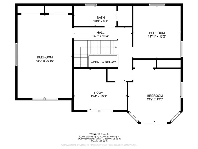 a bathroom with a granite countertop sink a mirror and shower
