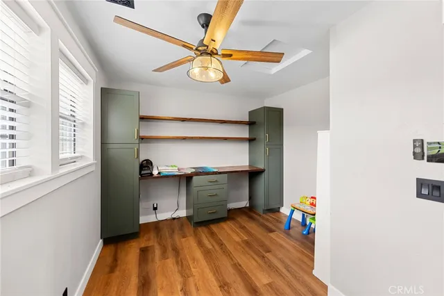 a view of a backyard with trees