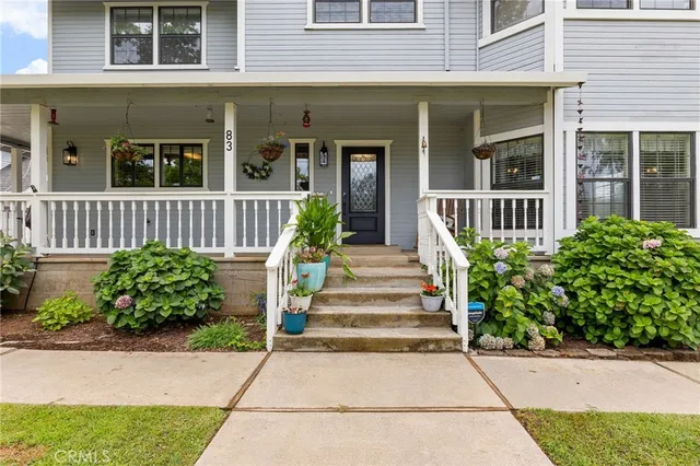 a kitchen with stainless steel appliances granite countertop a stove a sink dishwasher and a refrigerator