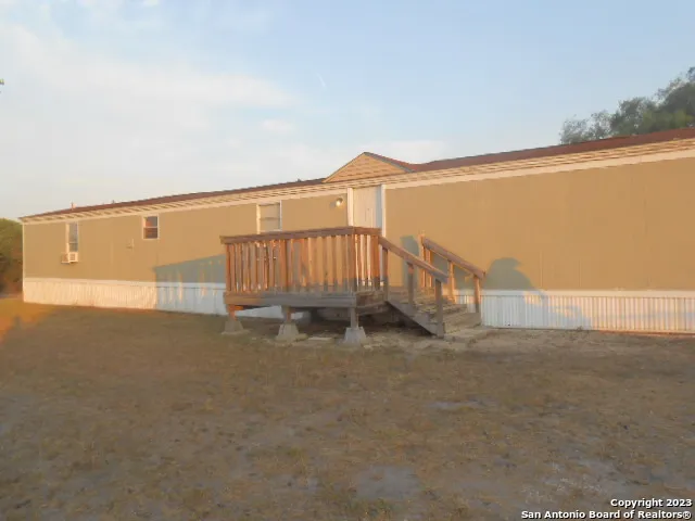 a view of a house with a street