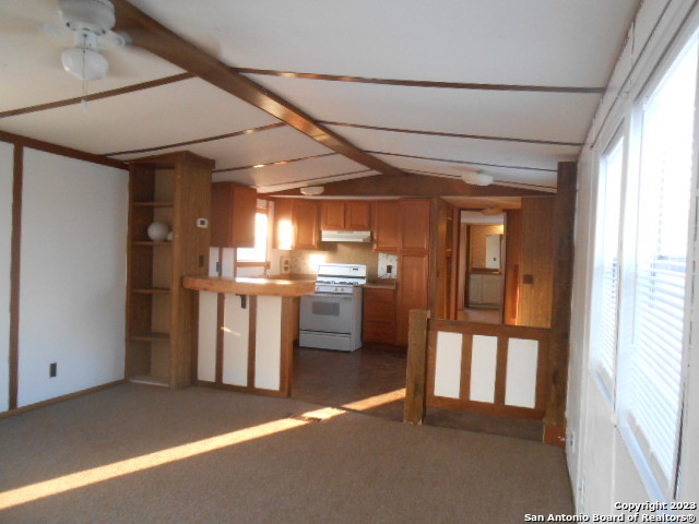 5420 Uecker Road San Antonio, TX 78220 - Photo 11 of 23 a view of a hallway with a kitchen