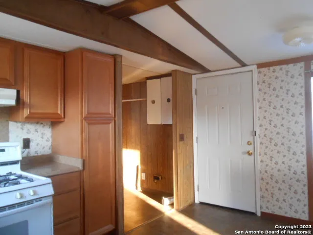 a bathroom with a shower and a sink