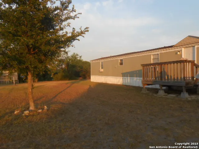 a view of back yard of the house