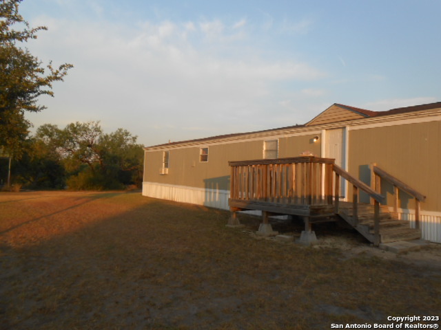 5420 Uecker Road San Antonio, TX 78220 - Photo 6 of 23 a view of a house with a yard
