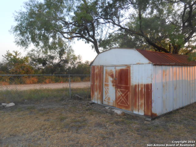 5420 Uecker Road San Antonio, TX 78220 - Photo 7 of 23 a backyard of a house with lots of green space