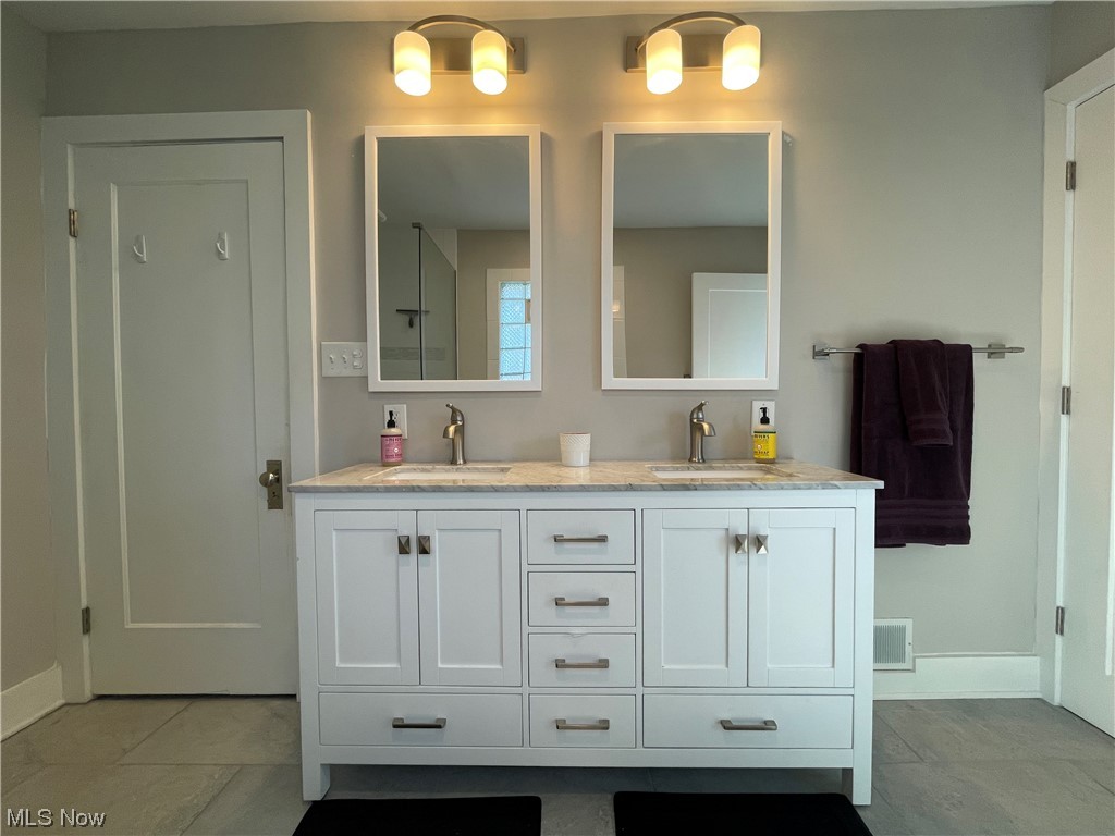 3294 East Overlook Road Cleveland Heights, OH 44118 - Photo 11 of 13 Bathroom with double sink vanity and tile floors