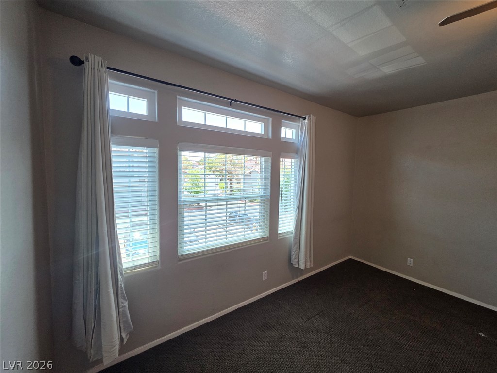 2275 Ramsgate Drive Henderson, NV 89074 - Photo 46 of 84 Well-lit room with ample natural light pouring through expansive windows, perfect for quiet contemplation.