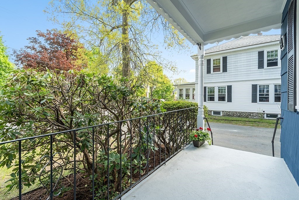 74 Viola Street Lowell, MA 01851 - Photo 12 of 35 a pathway of a house with a yard