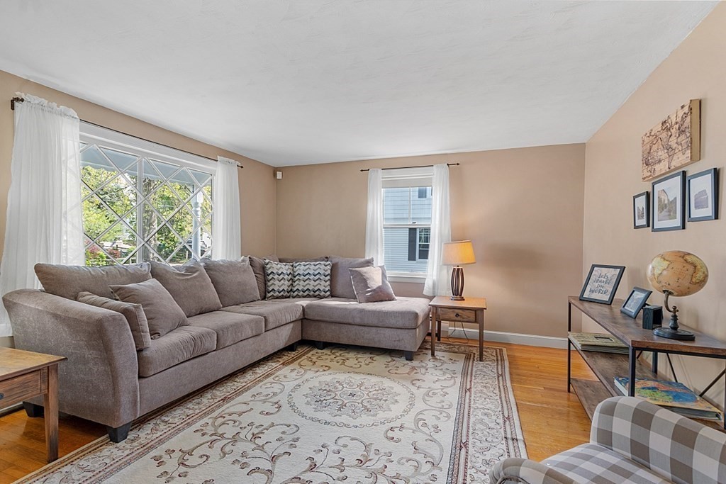 74 Viola Street Lowell, MA 01851 - Photo 14 of 35 a living room with furniture and a window