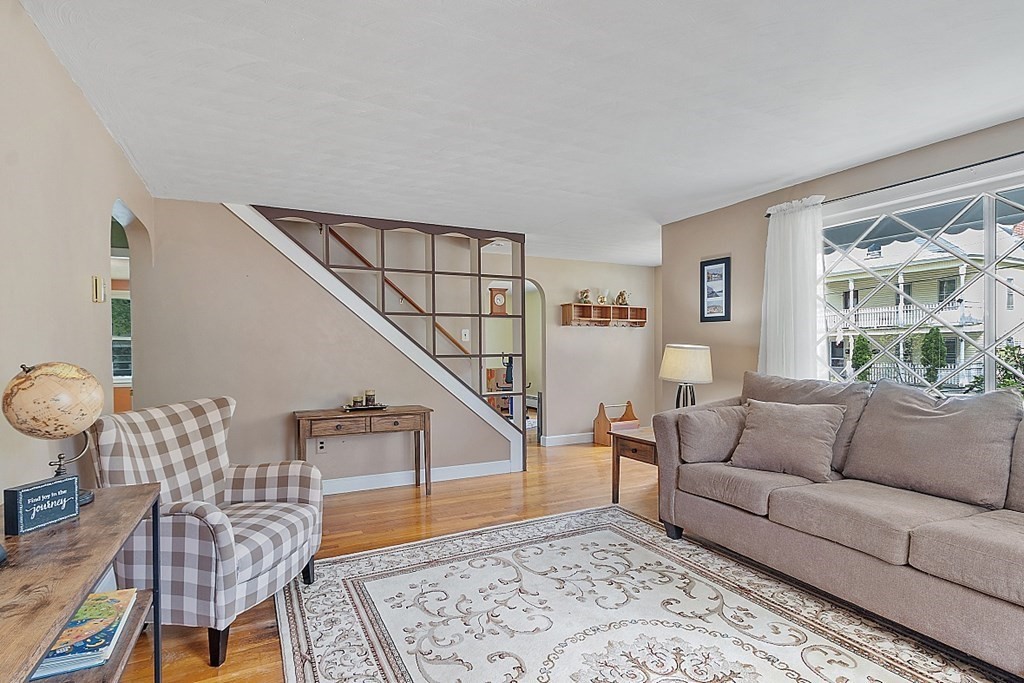 74 Viola Street Lowell, MA 01851 - Photo 15 of 35 a living room with furniture and a window