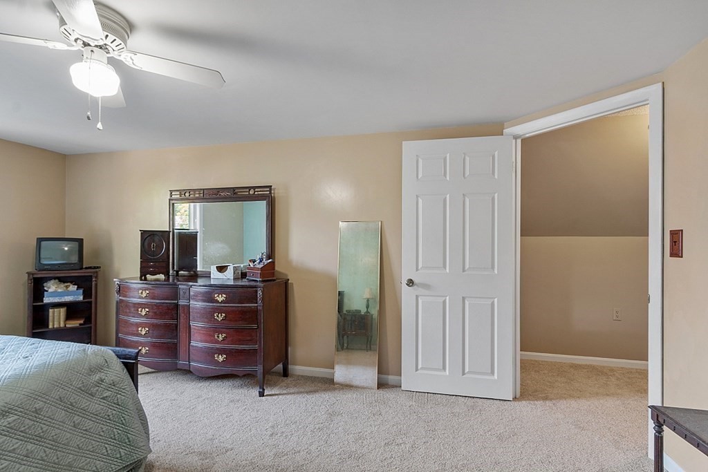 74 Viola Street Lowell, MA 01851 - Photo 28 of 35 a room with furniture and closet