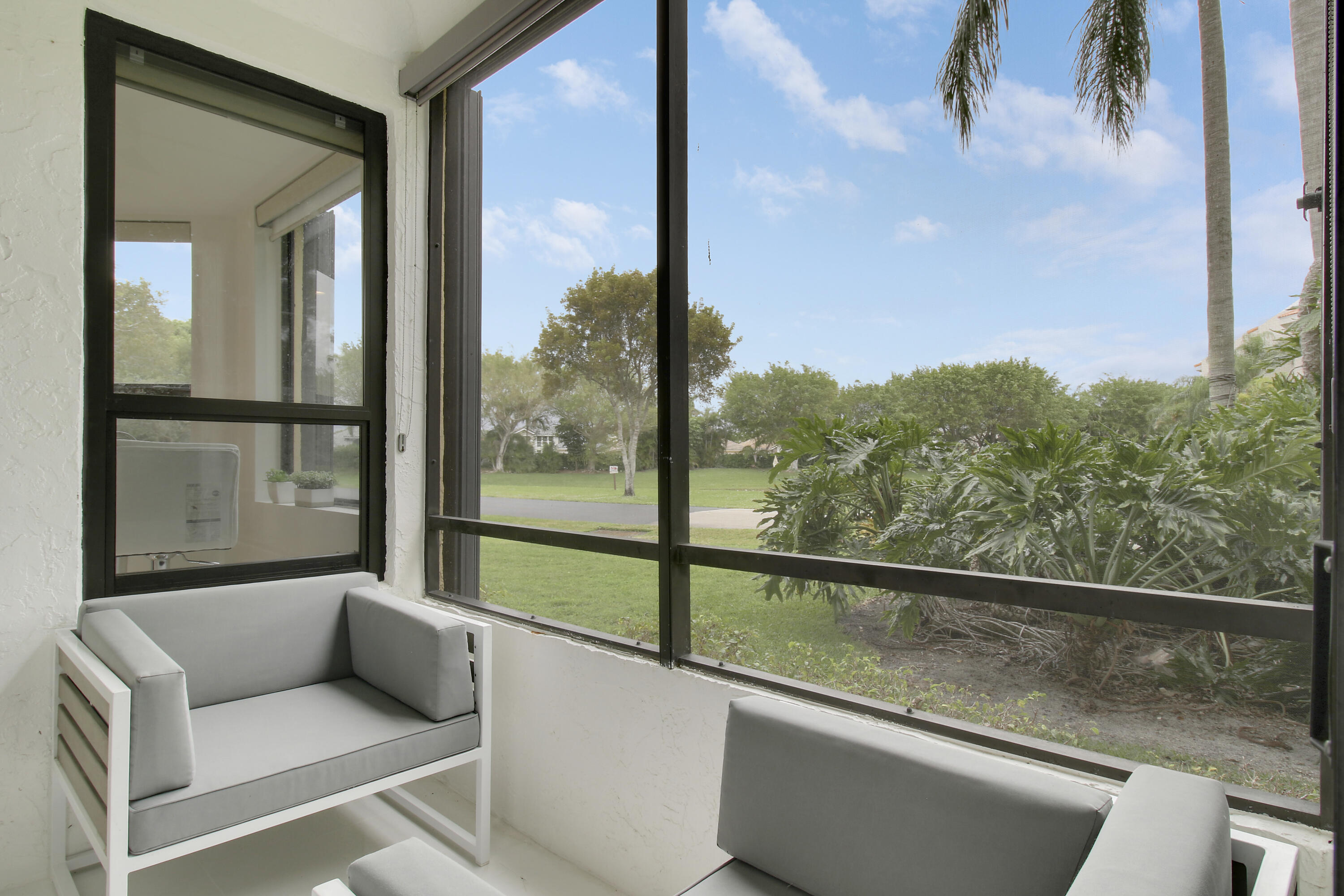 7535 La Paz Boulevard, Unit 105 Boca Raton, FL 33433 - Photo 21 of 45 Glass enclosed Patio