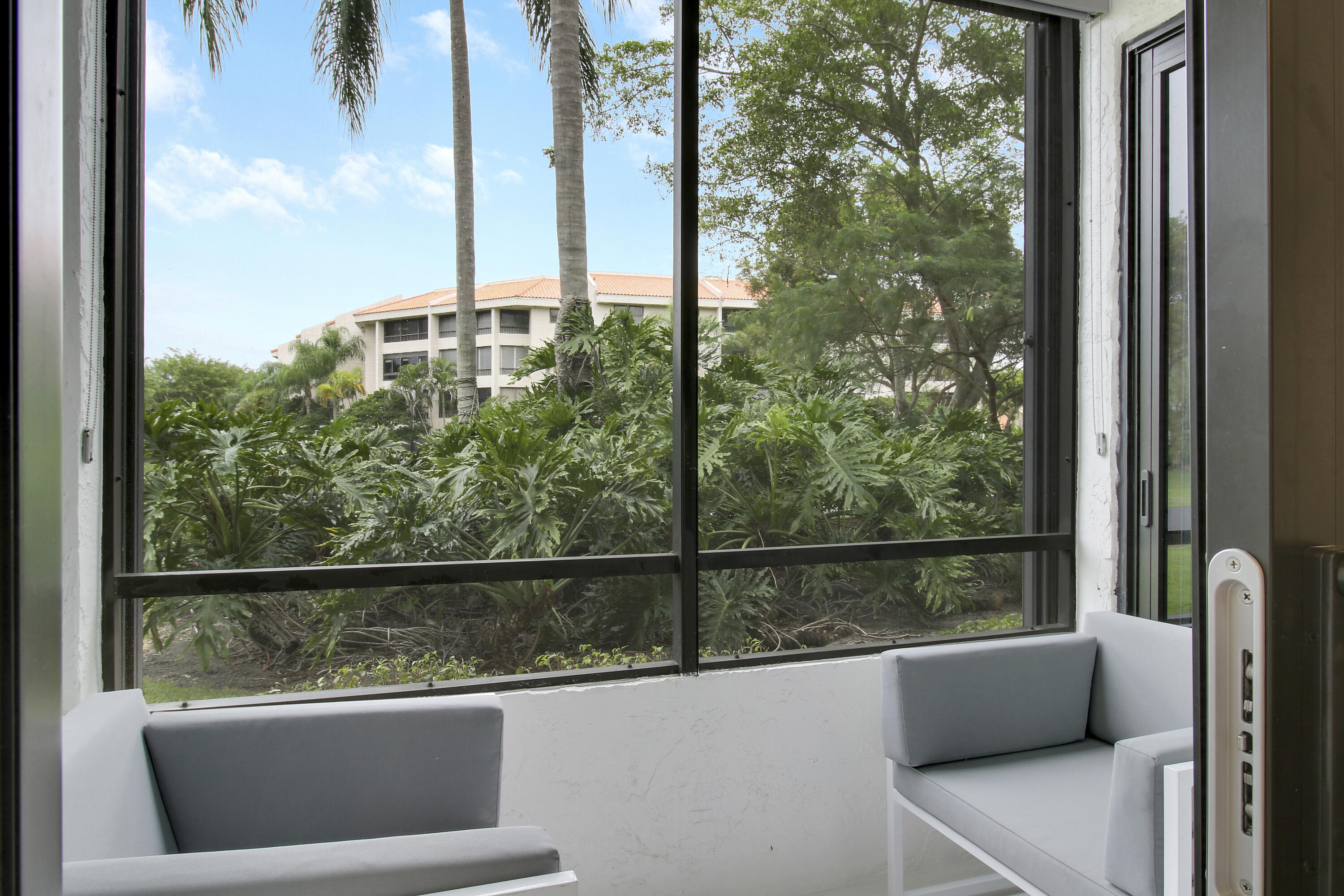 7535 La Paz Boulevard, Unit 105 Boca Raton, FL 33433 - Photo 22 of 45 Glass Enclosed Patio-1