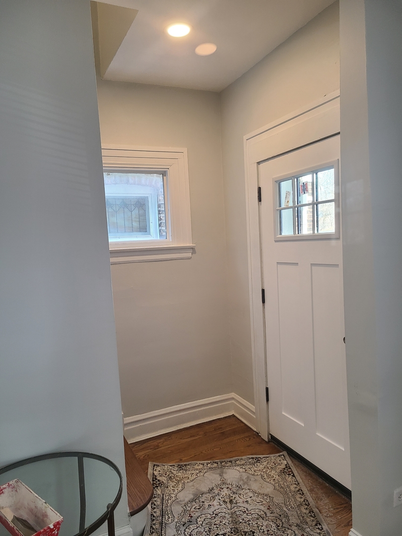 7744 South Champlain Avenue Chicago, IL 60619 - Photo 2 of 21 an empty room with a window