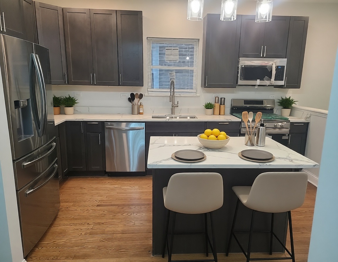 7744 South Champlain Avenue Chicago, IL 60619 - Photo 10 of 21 a kitchen with stainless steel appliances granite countertop a sink refrigerator and cabinets