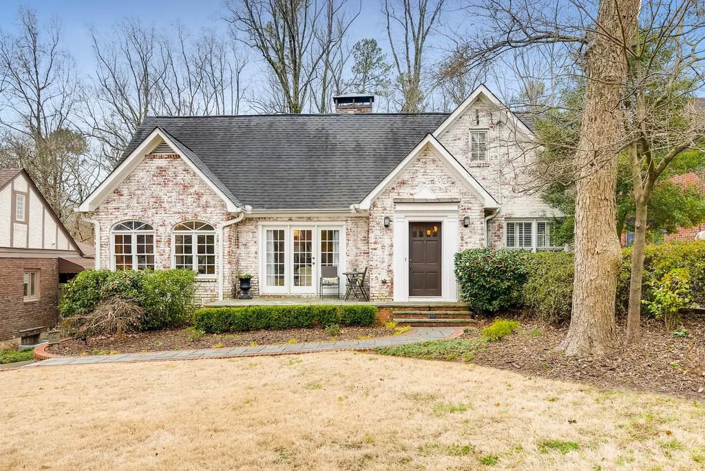 Beautiful traditional Morningside home - lives large over three levels! Stunning four sided brick house!