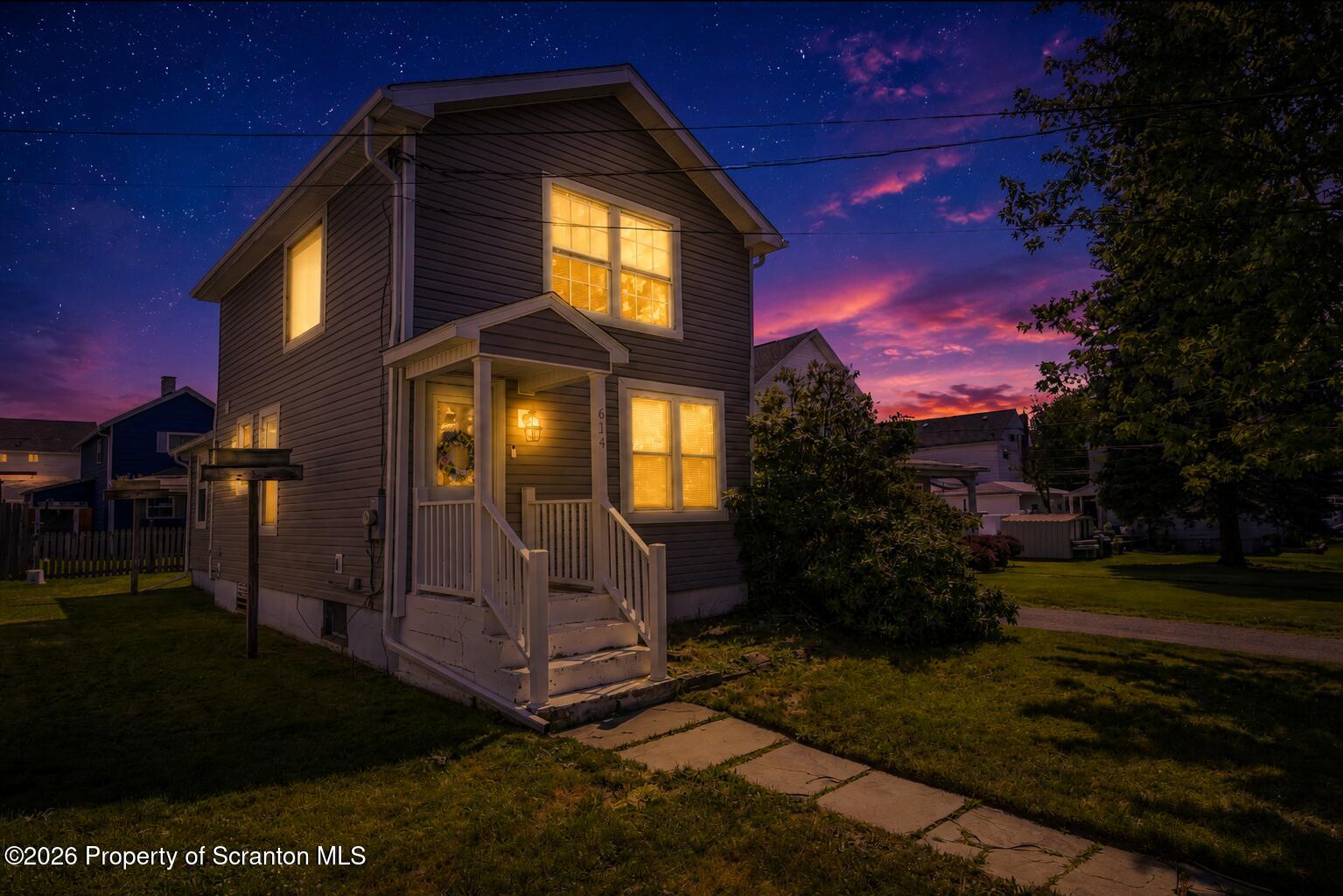 614 Warren Street Blakely, PA 18452 - Photo 2 of 44 front of house at night