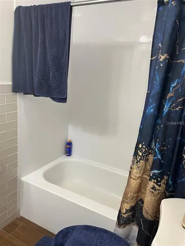 a bathroom with a bathtub