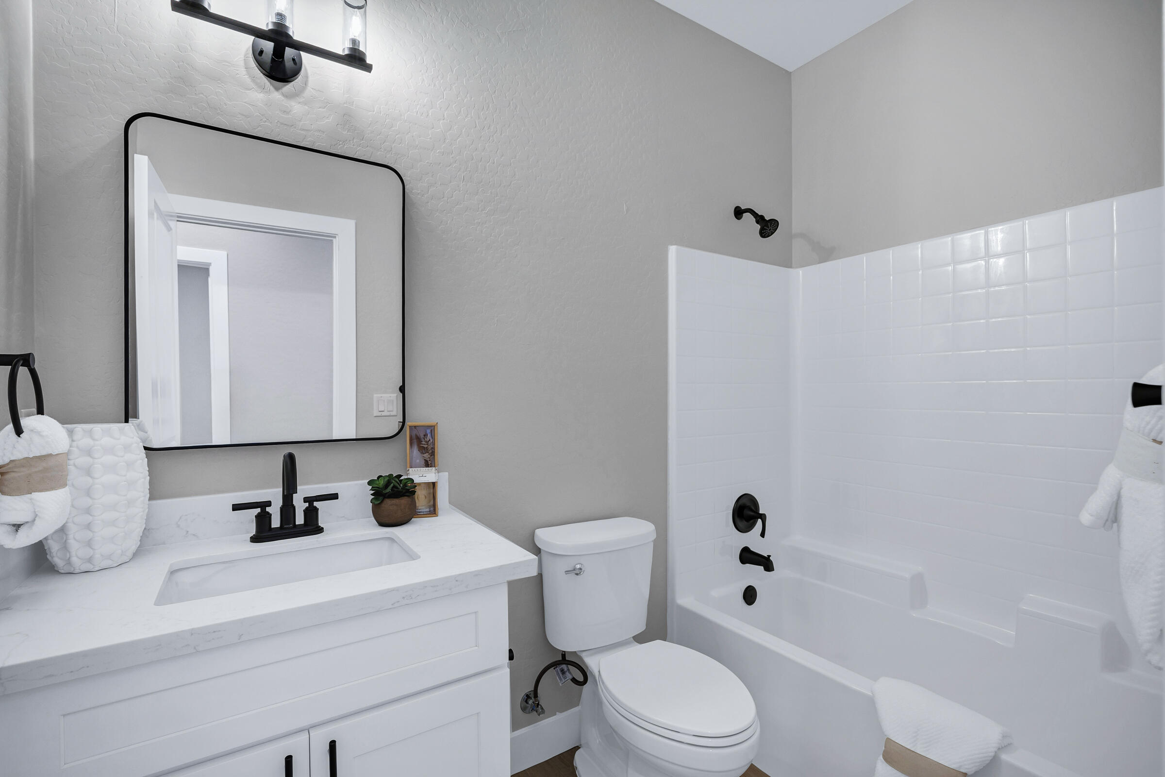 1105 East Frontier Street Payson, AZ 85541 - Photo 19 of 26 a bathroom with a sink a toilet and shower
